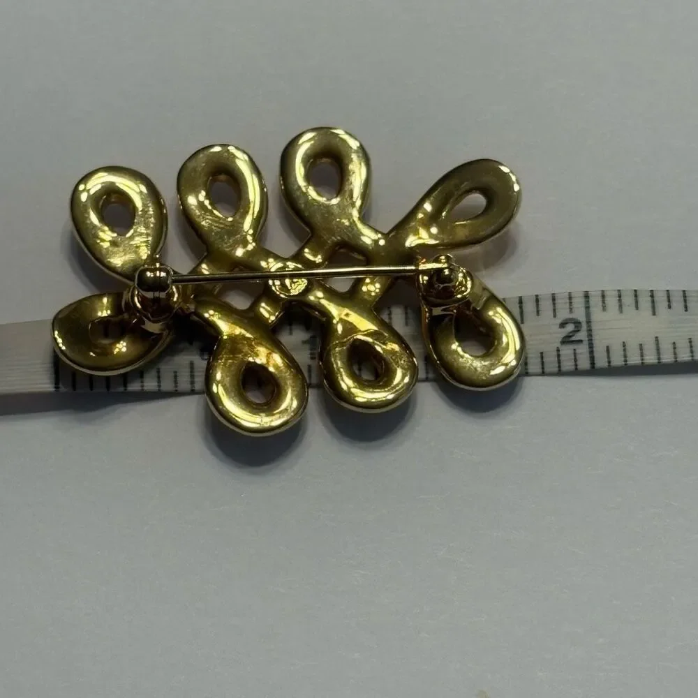 Vintage Swarovski Brooch Clear Crystals Gold Tone Swirl Twist Brooch